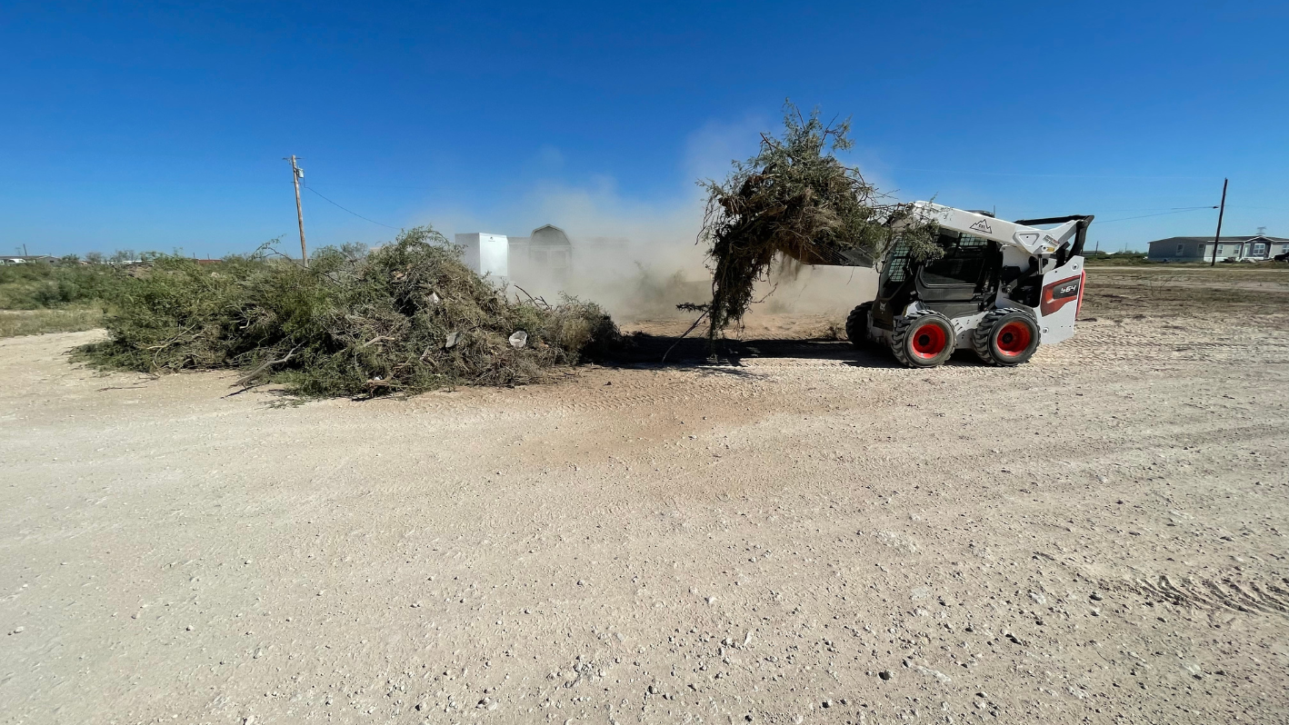 A tractor that is sitting in the dirt